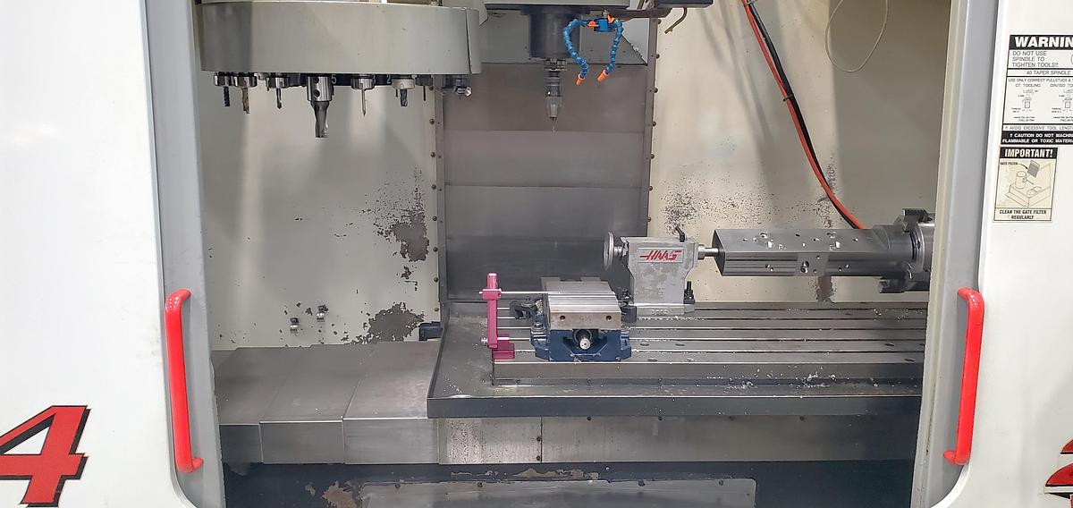 Used 2001 Haas VF4D with Haas HRT210 4th Axis Table, Tailstock, Auger, Prog. Coolant, Quick Code