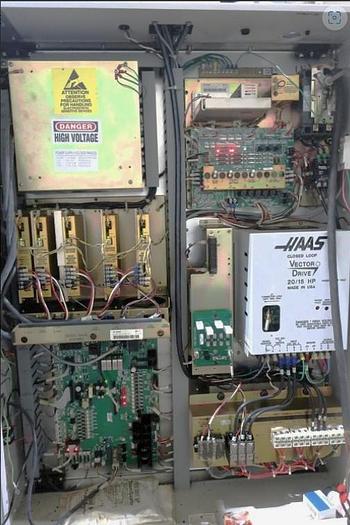 Used 2003 Haas VF-2D with 4th/5th Axis Tables, Pcool, Auger