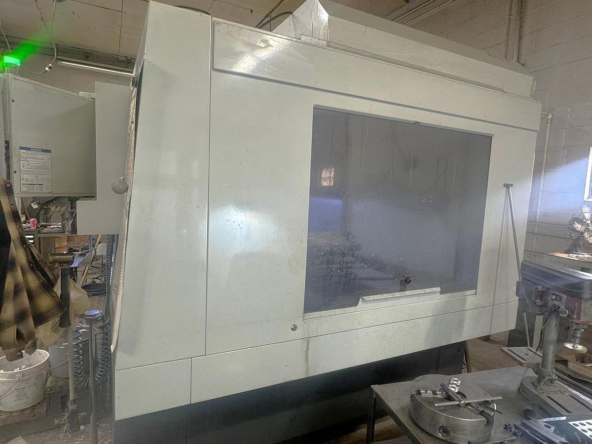 Used 2014 Haas VF-9/40 with 40 Station ATC, Probing, Chip Auger, Tooling, Vices