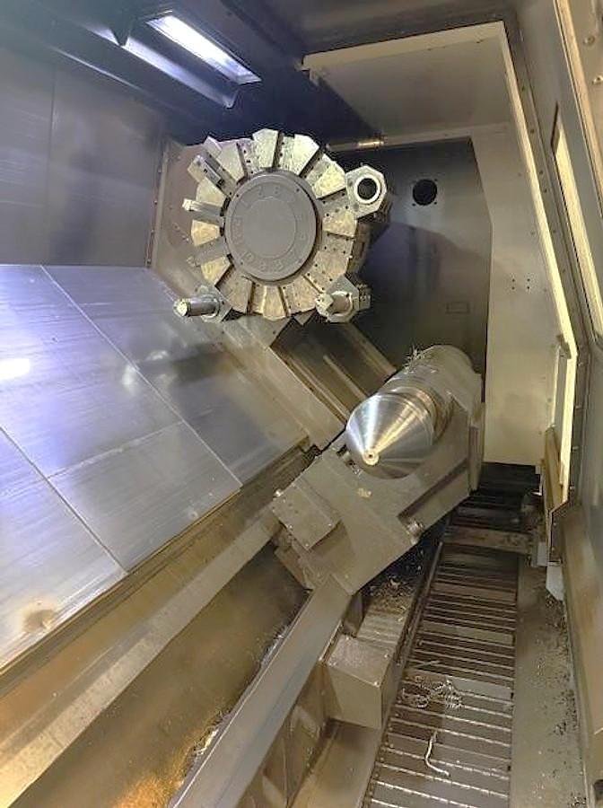 Used 2006 Doosan Puma 700L with 24" Hyd. Chk, 6.5" Bar Cap., 126" Turn Length, SMW Steady Rest, Tailstock, Conveyor, Tool Eye