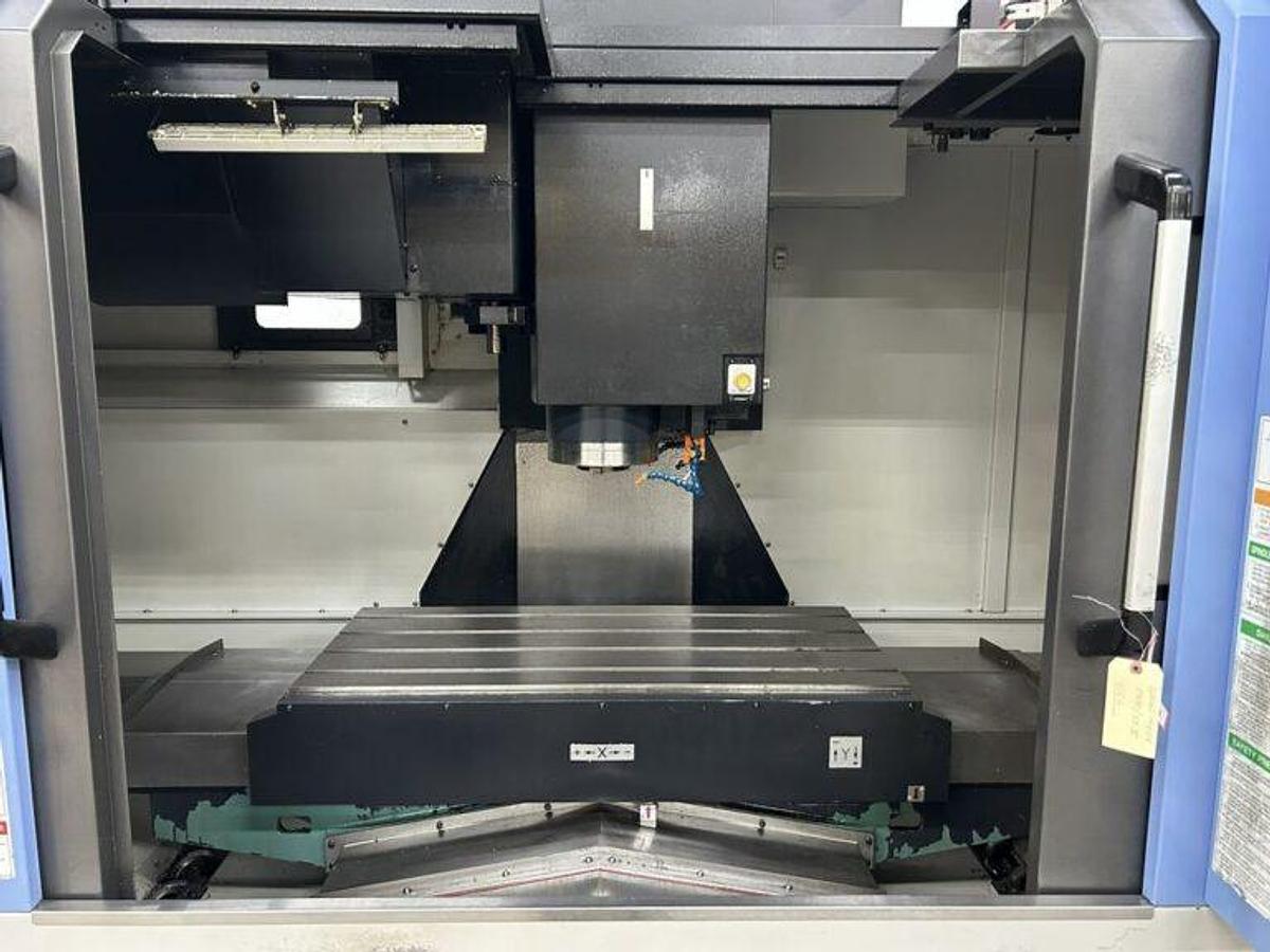 Used 2022 DN Solutions Mynx 5400/50 II with 4th Axis Drive, CAT50 Big Plus Spindle, Chip Conveyor, Mist Collector, Conversational