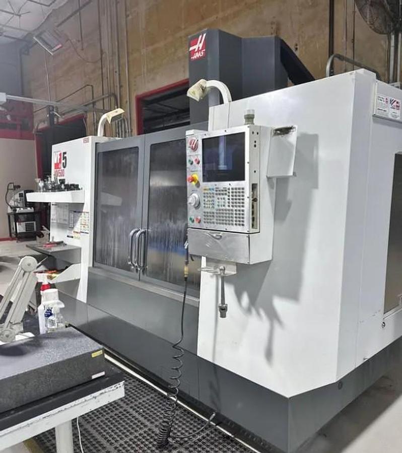 Used 2011 Haas VF5/40 w/ Haas HRT310 Rotary Table, 10,000 RPM, PCool, HSM, Auger