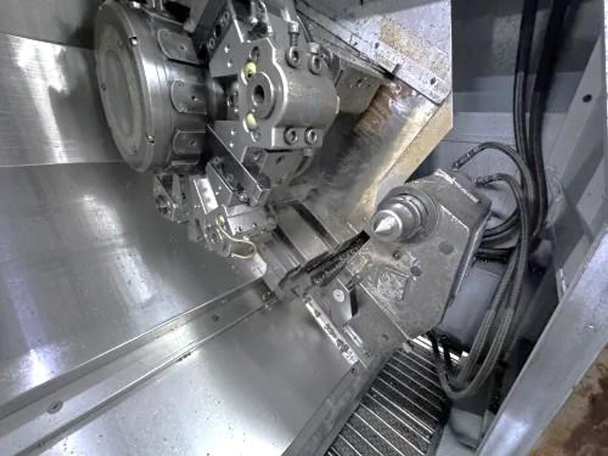 Used 2004 Mori Seiki SL-204MC with C Axis Rotation, Mill/Drilling Capability, Tailstock, Collet Chuck, Chip Conveyor, 2" Bar Capacity