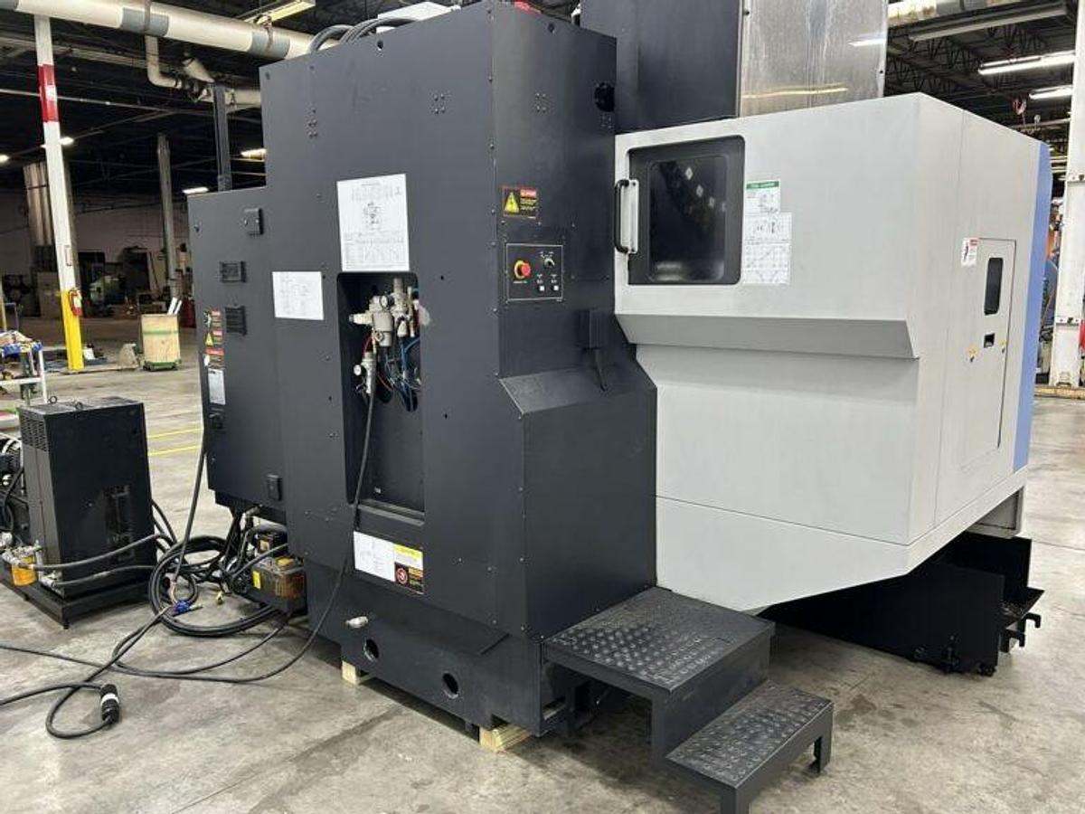 Used 2022 DN Solutions Mynx 5400/50 II with 4th Axis Drive, CAT50 Big Plus Spindle, Chip Conveyor, Mist Collector, Conversational