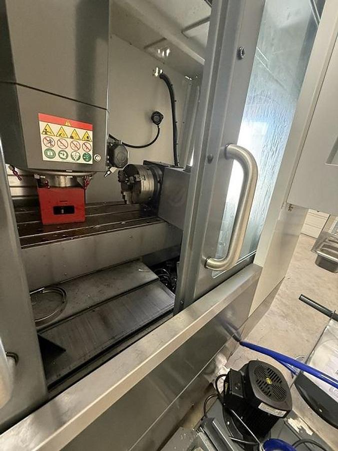 Used 2024 Haas VF-2SS, HRT210 Rotary Table w/8" 3-Jaw Chuck, WIPS Renishaw Tool & Part Probe, Thru the Spindle Coolant, High-Speed Machining, Programmable Coolant