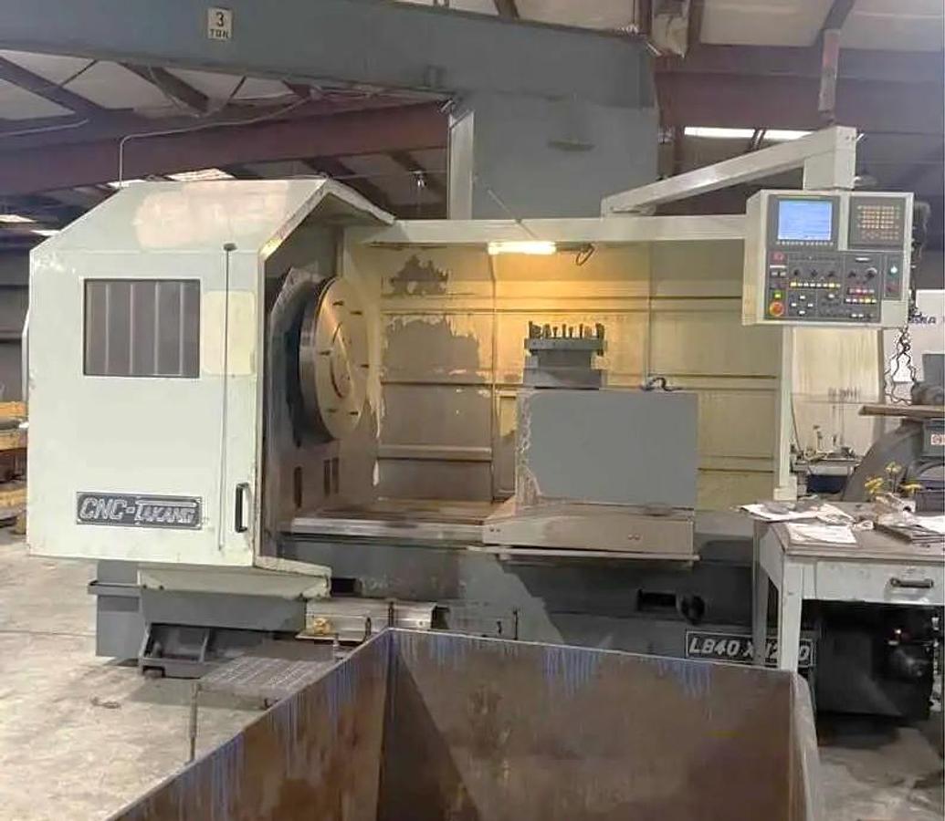 Used 2013 Takang LB40 x 1200 CNC Heavy Duty Lathe with 60" sw, 39.3" Max Cut Diam., 600 RPM, 6" Bore, 36" Chuck, 4 Pos. Trt., Fanuc