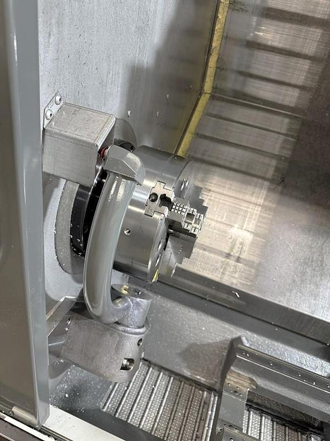 Used 2022 Haas ST-25Y Chucker (no tailstock) with 10" Chuck, 3" Bar Capacity, Milling, Y Axis, Conveyor, Auto Parts Loader System