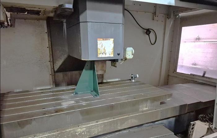 Used 2013 Haas VF-6/50 with Tool Probing, 30 Station Side Mounted Tool Changer, Programmable Coolant Nozzle