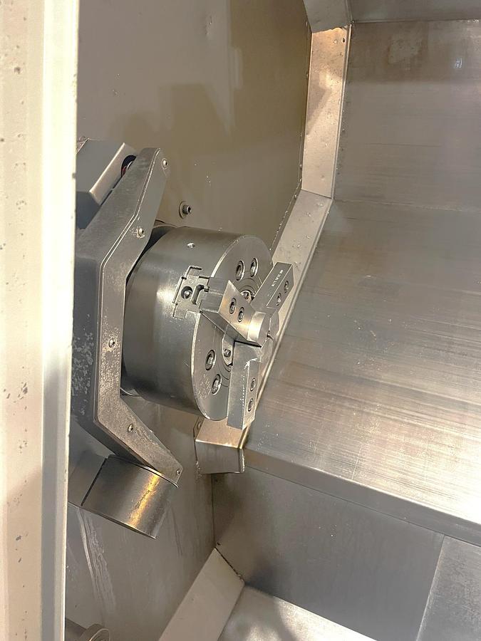 Used 2006 Haas SL-30T with Haas Servo 300 Barfeeder, 3" Bar Capacity, 10" Chuck, Tailstock, Toolsetter, Chip Auger, 12 Pos. Block Turret