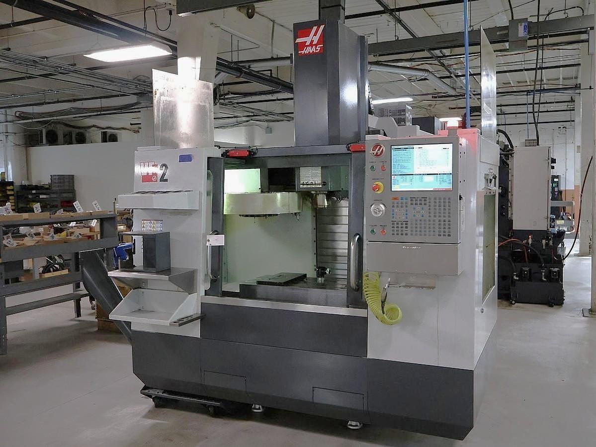 Used 2013 Haas VF2 with Probing, 4th Axis Drive, Chip Auger, 20 Station Carousel Style ATC