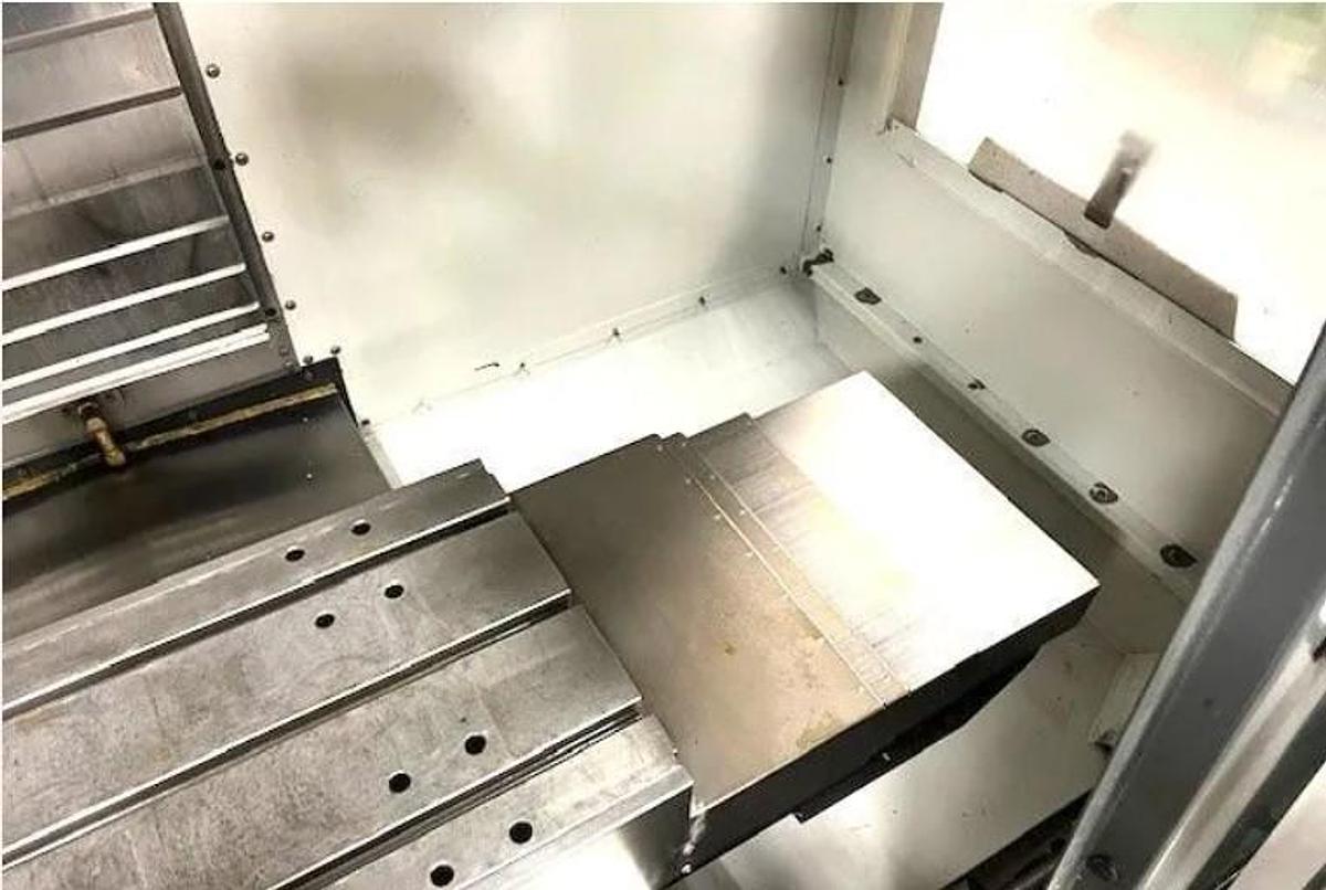 Used 2015 Haas VF1 with 10,000 RPM, 24 Station Side Mounted ATC, Chip Auger, Extended Memory, Remote Jog Handle