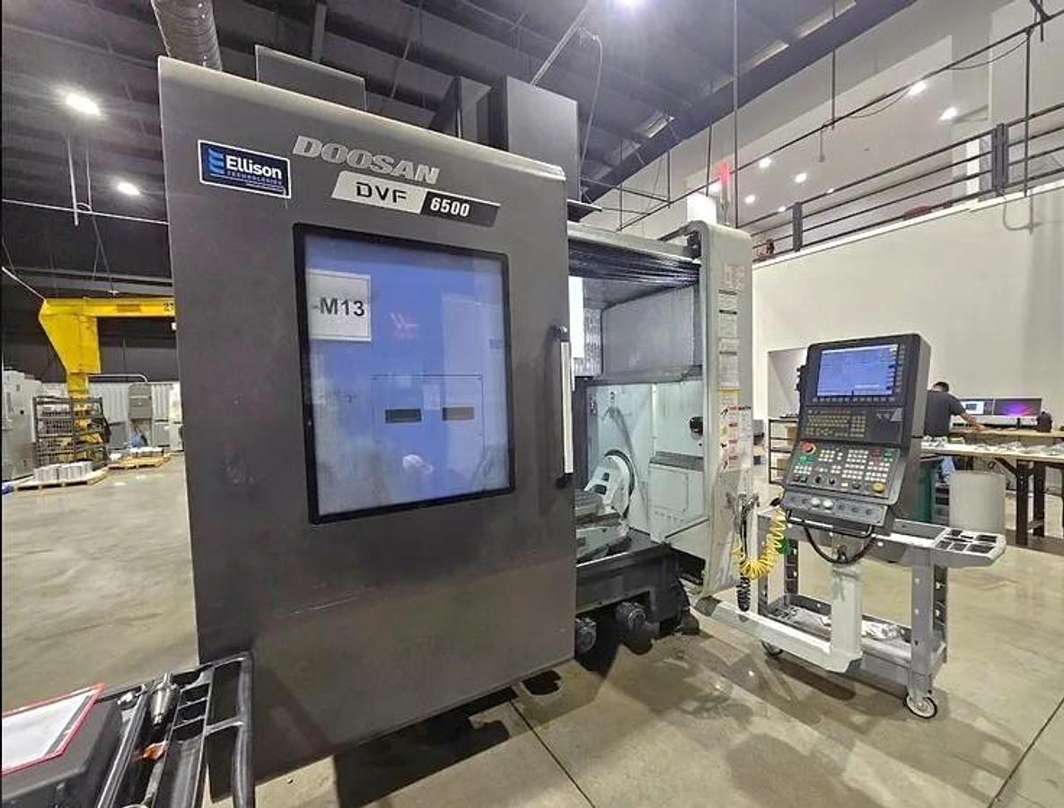 Used 2020 Doosan DVF 6500 5 Axis Trunnion VMC with 18,000 RPM, 60 ATC, Coolant Thru Spindle, Probing, Chip Conveyor