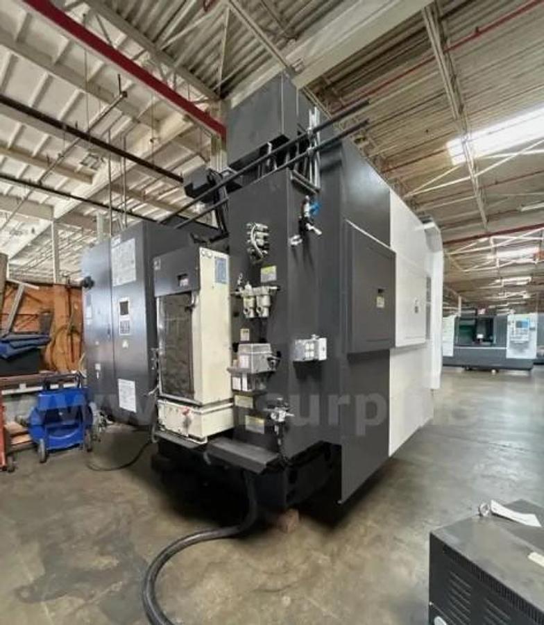 Used 2019 Okuma Genos M560-V with Chip Conveyor, High Pressure Coolant, Tool Probe
