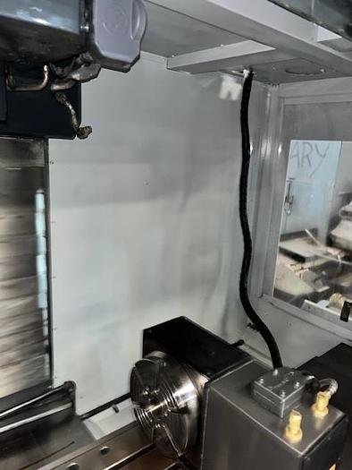 Used 2014 Haas VF4 with Haas HRT210 4th Axis Rotary Table, 24 Station SMATC, PCool, Chip Auger