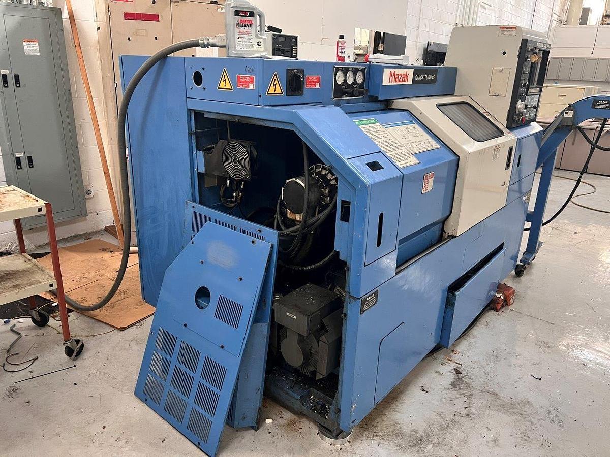 Used 1988 Mazak QT15 Universal with Mazatrol T-2 Control, 8" Chuck, 2" Bar Capacity, Chip Conveyor, Tool Presetter, Tailstock