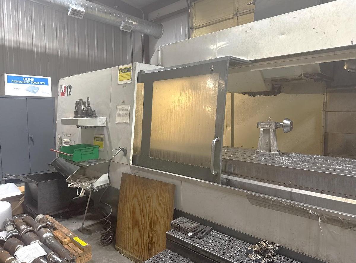 Used 2014 Haas VF-12/50 with 30 Pos. Side Mounted ATC, Wired for 4th Axis, High Pressure Coolant Thru Spindle