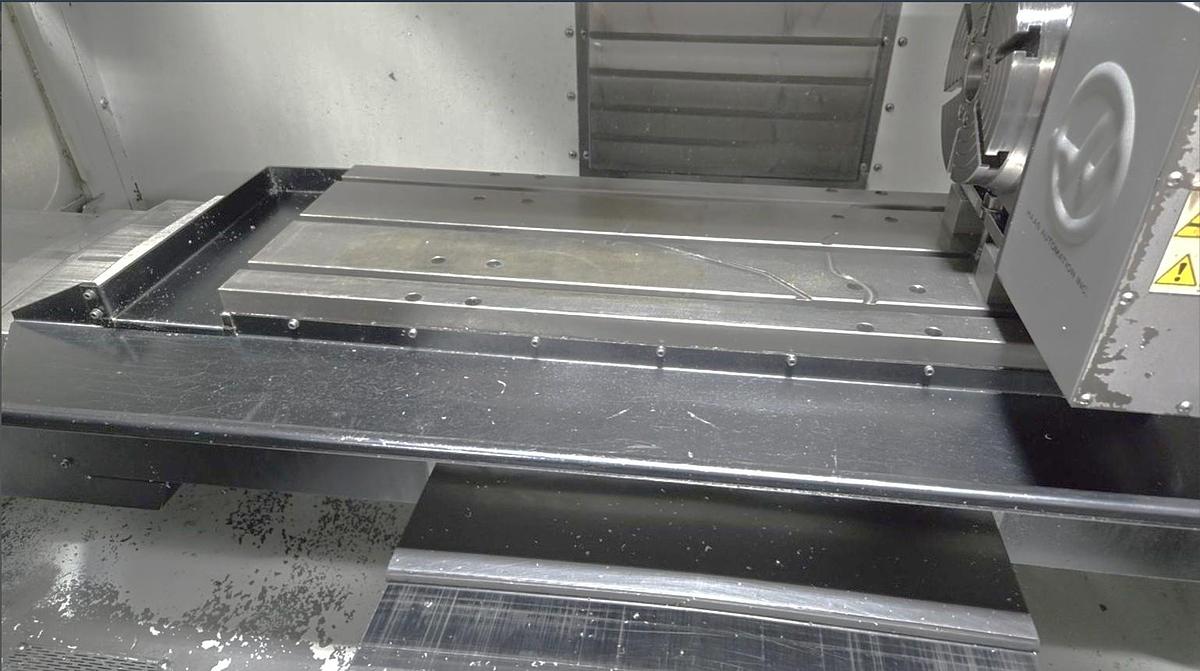 Used 2006 Haas VF2SS with 4th Axis Drive ONLY, Remote Jog Handle, Chip Auger, Programmable Coolant Nozzle