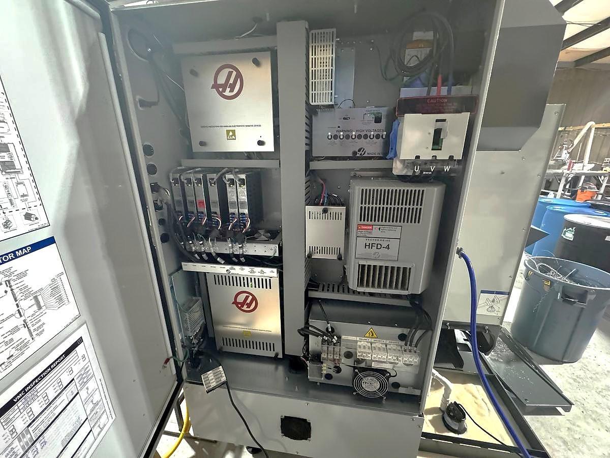 Used 2023 Haas VF-2SS with WIPS Renishaw Tool & Part Probe, Thru the Spindle Coolant, 4th Axis Drive & Wiring, Chip Auger