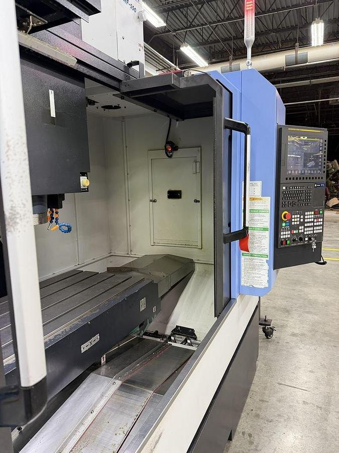 Used 2022 DN Solutions Mynx 5400/50 II with 4th Axis Drive, CAT50 Big Plus Spindle, Chip Conveyor, Mist Collector, Conversational