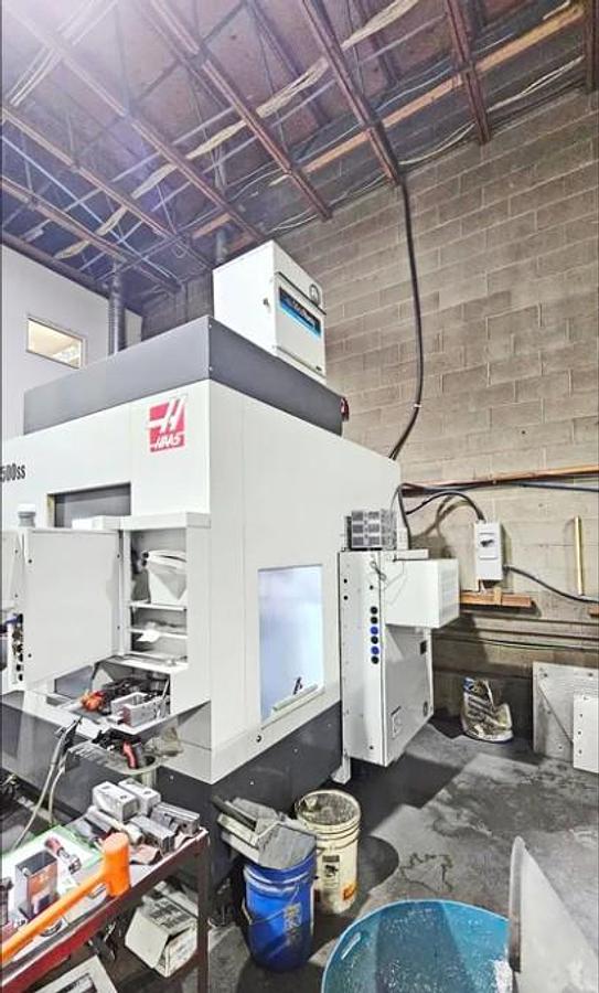 Used 2021 Haas UMC-500SS 5 Axis Universal Machining Center with Coolant Thru Spindle, Probing, HSM, Conveyor, 50 Station ATC