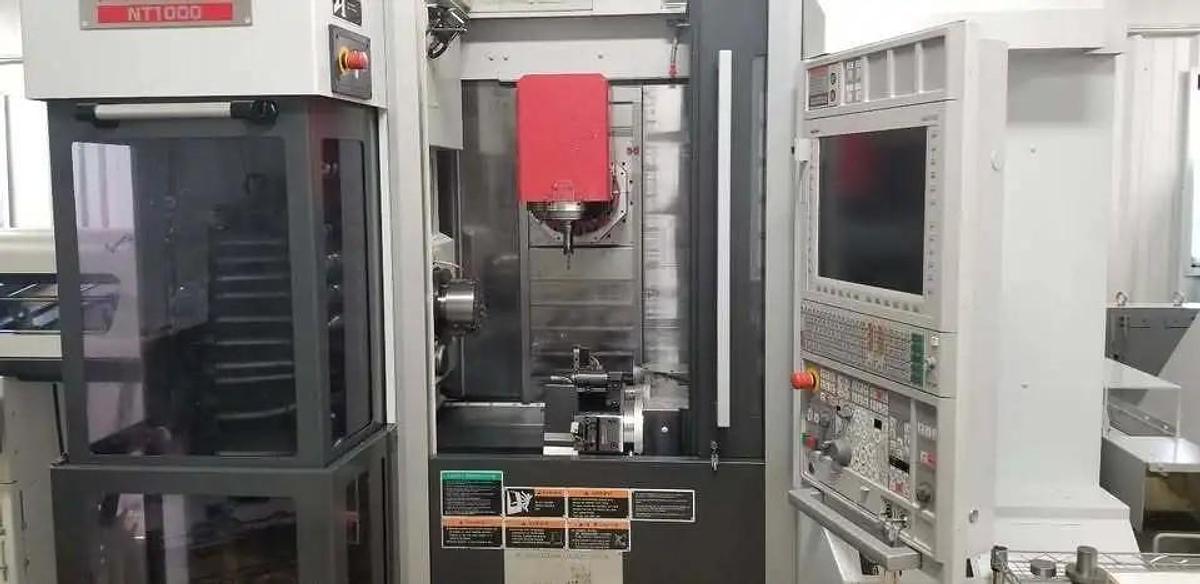 Used 2010 Mori Seiki NT1000 SZ with C Axis Spindle Rotation, Live Milling, Y Axis, B Axis Pendulum Head, Lower Turret, Barfeed, MORE !!