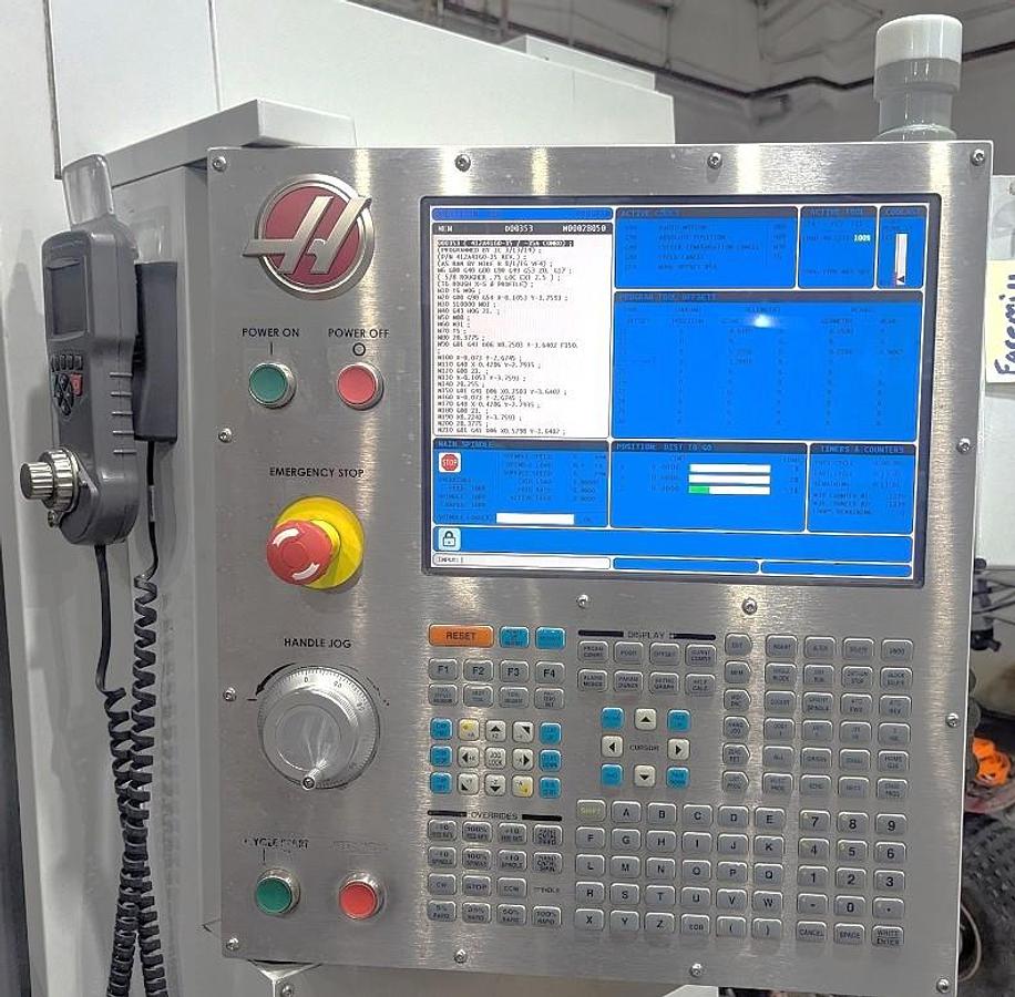 Used 2013 Haas VF-4SS w/ 4th Axis Drive, 24 Station Side Mounted ATC, Programmable Coolant, Multi Auger Conveyor, 12,000 RPM