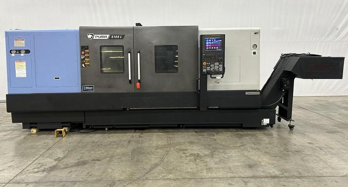 Used 2022 DN Solutions Puma 5100LC with 24.75" 4 Jaw Hyd. Chuck, 10.5" Spindle Bore, 82" Turn Length, Chip Conveyor, Tailstock