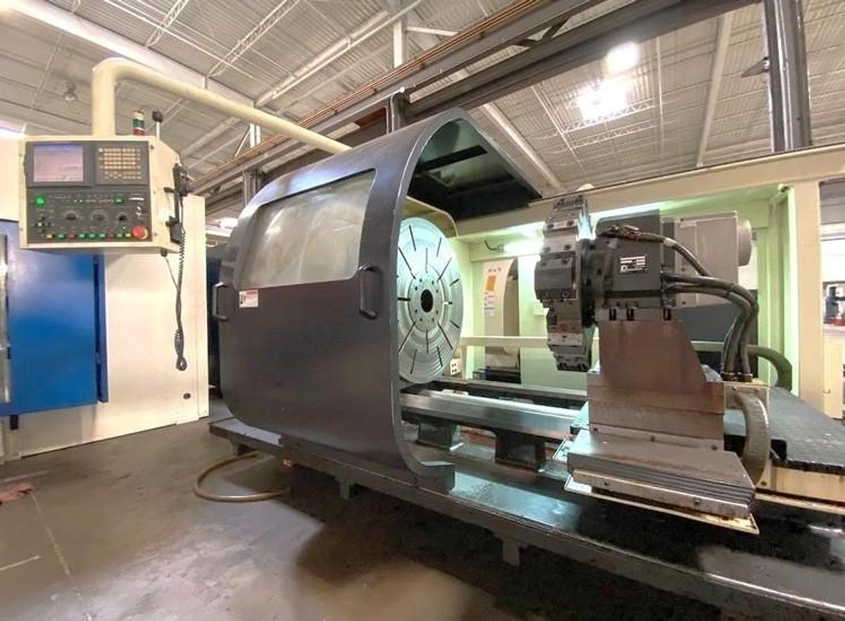 Used 2007 Hwacheon T130 CNC T-Lathe with 51.18" Swing, 35.83" Max Cut Diam., 400 RPM, 6.1" Bore, 50" Chuck, 12 Station Turret, Fanuc