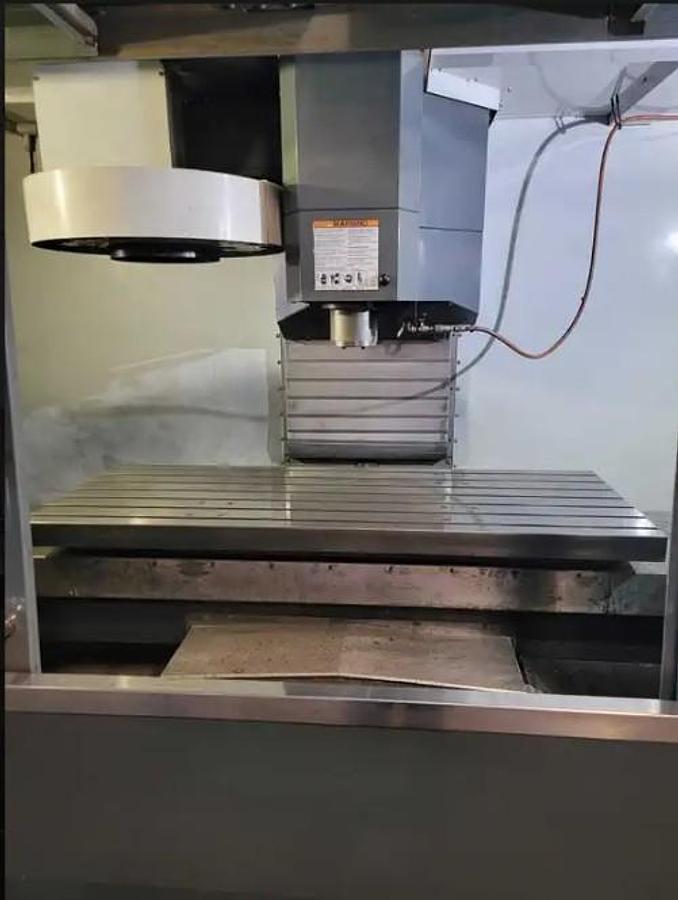 Used 2014 Haas VF5/40 XT with Extended 60" X Axis Travel, Chip Auger, Prog. Cool, 20 Station ATC, Rigid Tap