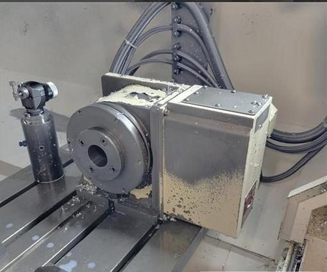 Used 2015 Okuma M560-V with 4th Axis Rotary Table, Renishaw Tool & Part Probing, 15k RPM, 32 Pos. ATC, Chip Claster HPC