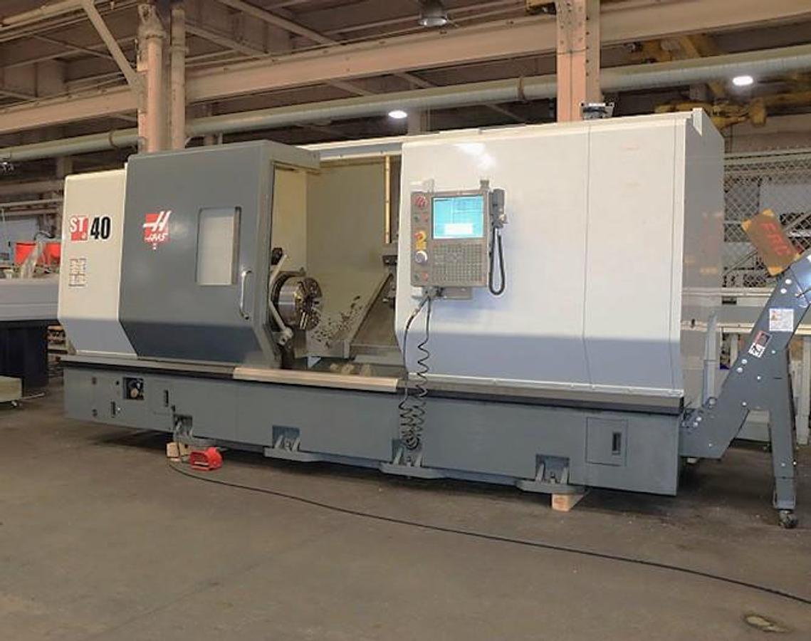Used 2012 Haas ST-40 Chucker with 15" Hydr. Chuck, Tool Presetter, Chip Conveyor, 4" Bar Capacity, Some Tool Holders (no tailstock)