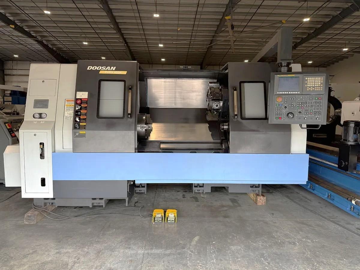 Used 2012 Doosan Puma 400MB with C Axis, Milling Capable, 15" Hyd. Chk, 4.5" Bar Cap., 41.3" cc, Tailstock, Conveyor, Live Tooling