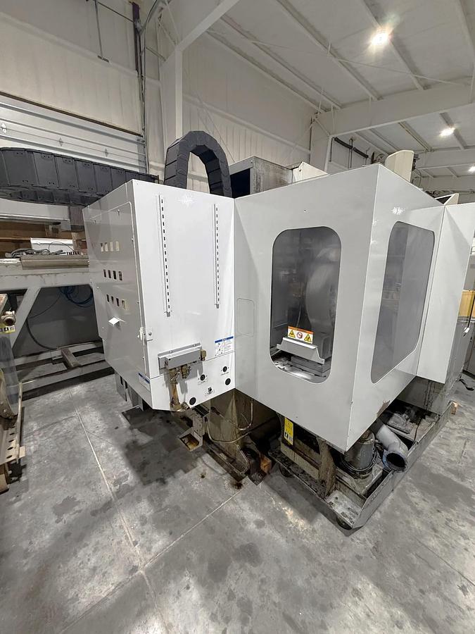 Used 2009 Haas ES-5-4T with HRT 4th Axis Rotary Table, Tool Probing, Remote Jog Handle, Chip Auger