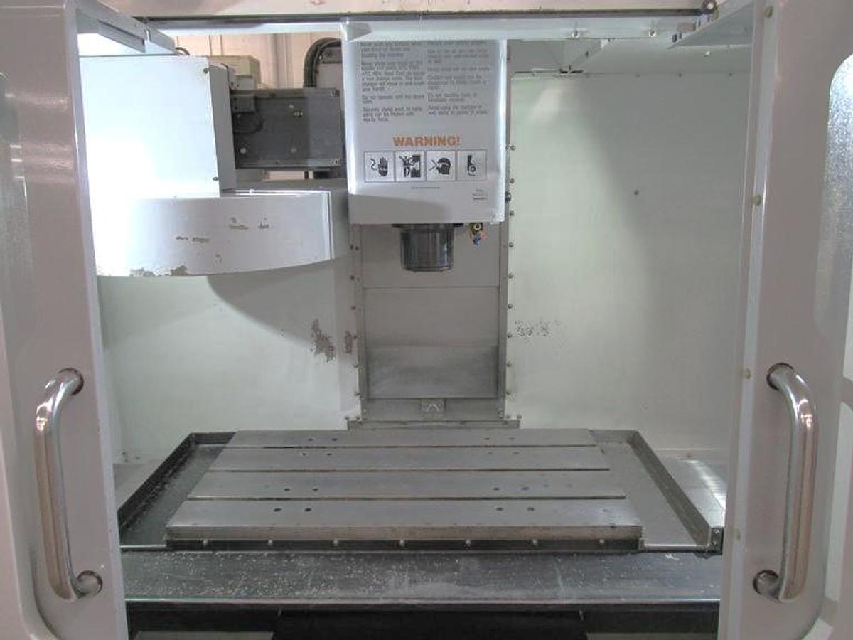 Used 2009 Haas VF2YT with Extended Y Axis Travel, Chip Auger, Rigid Tapping, 2 Spd Gearbox, 7500 RPM, 20 ATC