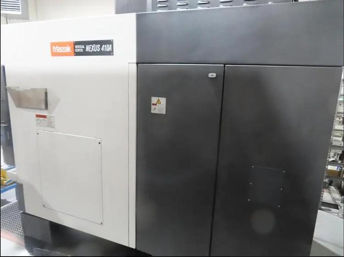 Used 2005 Mazak Nexus VCN-410A with Coolant Thru Spindle, Chip Conveyor, 30 Station Side Mounted ATC, 12,000 RPM