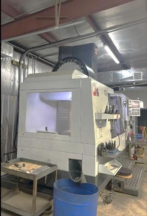 Used 2017 Haas VF-6/50 with 4th & 5th Axis Prewire, 8" Extended Z Axis Column, CT50 with (200) Toolholders,30 Pos. ATC, Chip Auger, Pcool