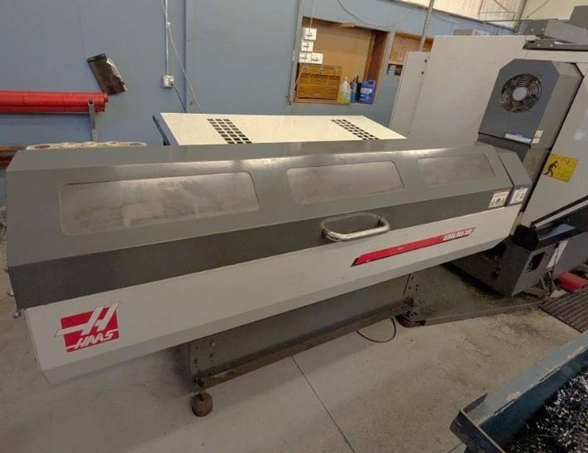 Used 2011 Haas ST-30M Chucker with Haas Barfeed, Chip Conveyor, Parts Catcher, Live Tooling, 3" Bar Cap., 10" Chuck, (5) Live Holders