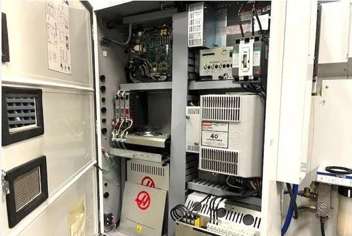 Used 2015 Haas VF1 with 10,000 RPM, 24 Station Side Mounted ATC, Chip Auger, Extended Memory, Remote Jog Handle