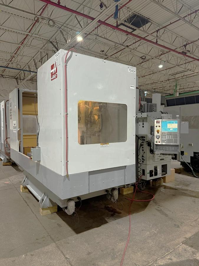 Used 26 Haas EC-1600-4X with 5 Axis Capability, Built In 4th Table, Removable 5th Axis Rotary Table, 50 ATC, Probing, Cool. Thru Spindle