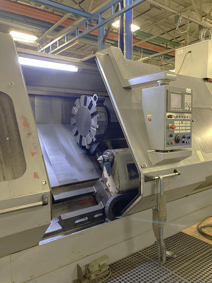 Used 2006 Leadwell LTC50-BL with 18" Hyd Chk, 4.6" Bar Cap., 33.5" sw, 80" cc, 1500 RPM, 50 HP, Steady Rest, Conveyor, Fanuc 0i-TC