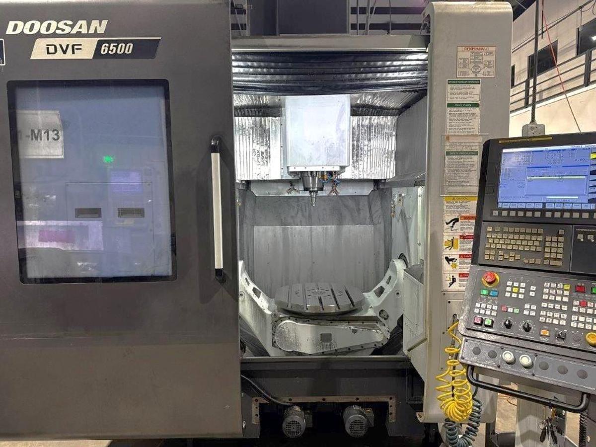 Used 2020 Doosan DVF 6500 5 Axis Trunnion VMC with 18,000 RPM, 60 ATC, Coolant Thru Spindle, Probing, Chip Conveyor
