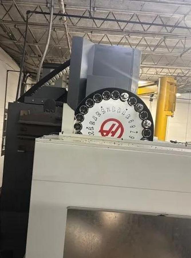 Used 2015 Haas VF-4SS w/Wired for 4th axis, Remote Jog Handle, WIPS Renishaw Tool & Part Probe, Programmable Coolant Nozzle, 1k Coolant Thru the Spindle
