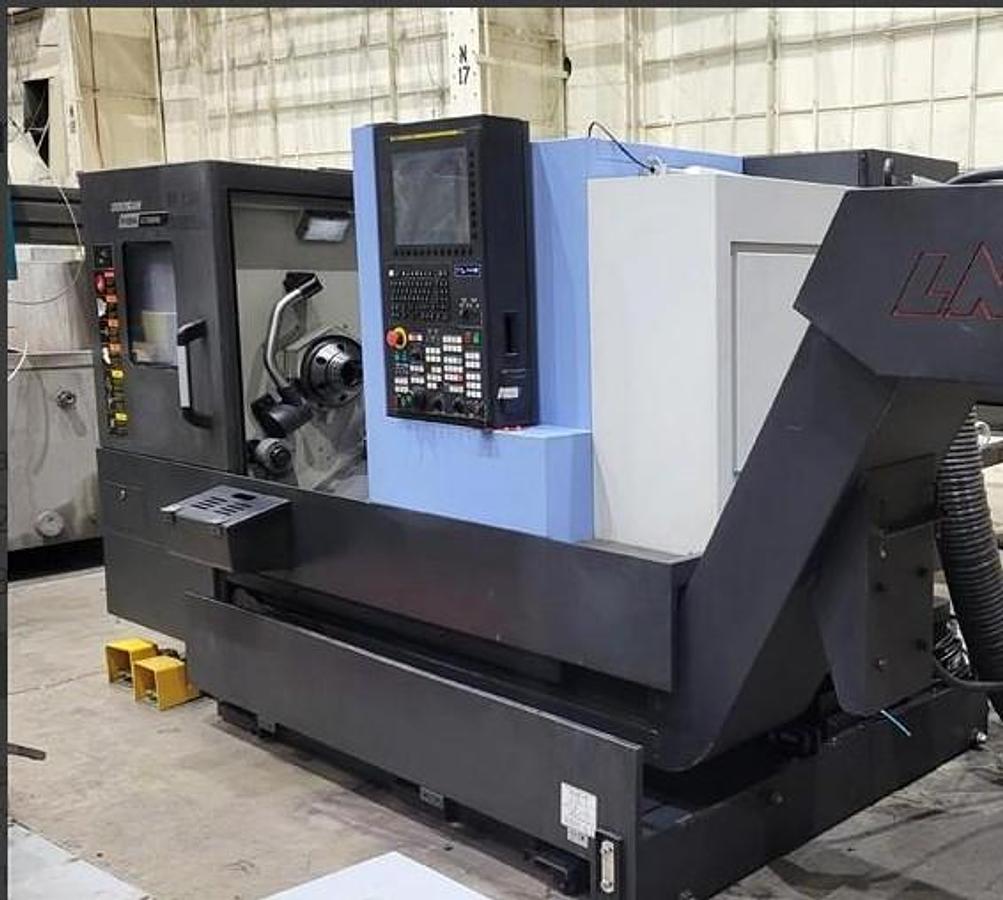 Used 2022 Doosan Puma GT-2600M with C Axis, Milling/Drilling, Collet Chuck, FMB Turbo Barfeeder, Tailstock, Chip Conveyor, Tool Eye