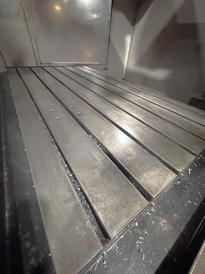 Used 2004 Haas VF8/50 with 50 Taper Spindle, 10,000 RPM Geared Head, Coolant Thru Spindle, Probe Ready, PCool, Auger, Side Mounted ATC