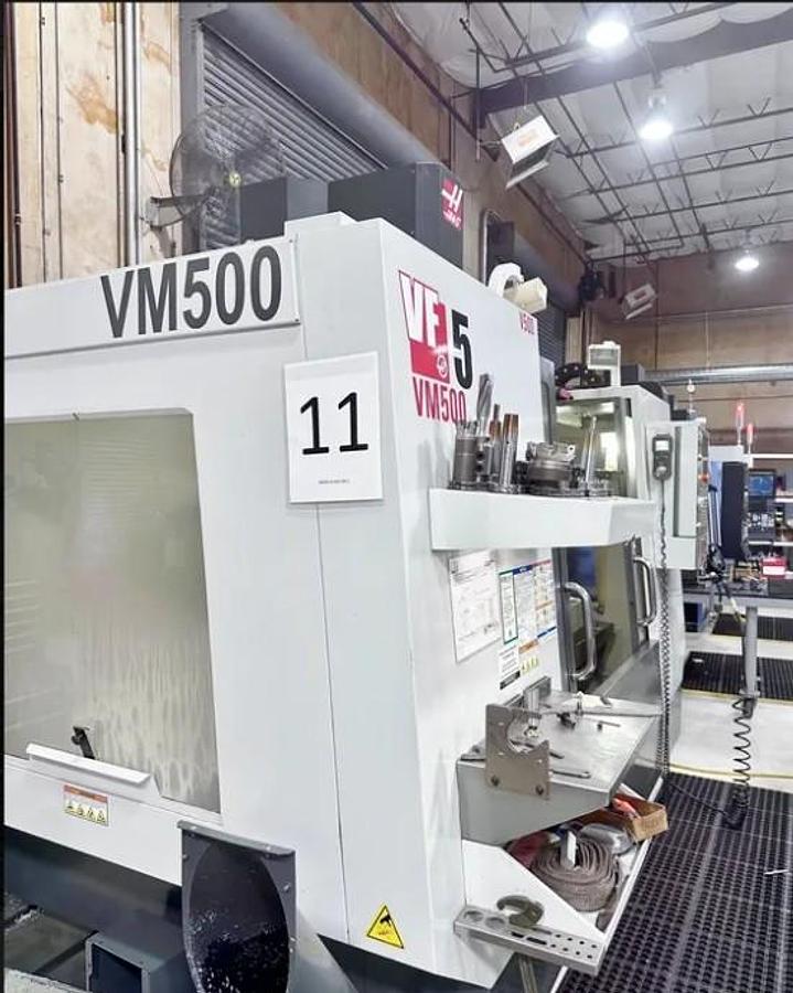 Used 2011 Haas VF5/40 w/ Haas HRT310 Rotary Table, 10,000 RPM, PCool, HSM, Auger