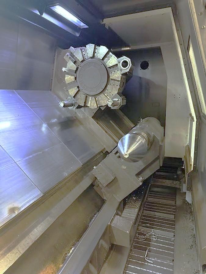 Used 2012 Doosan Puma 700L with 24" Hyd. Chk, 6.5" Bar Cap., 126" Turn Length, SMW Steady Rest, Tailstock, Conveyor, Tool Eye