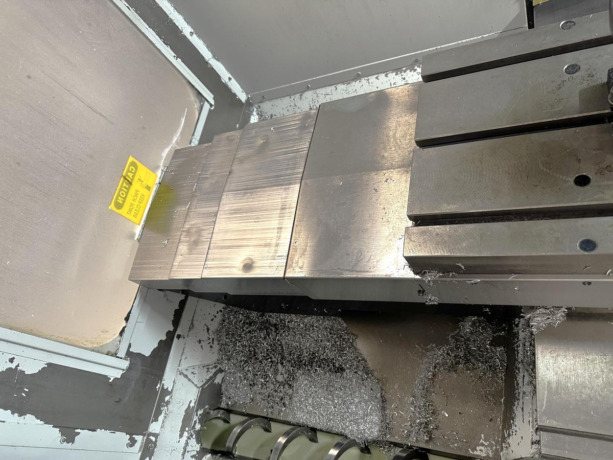 Used 2002 Haas VF2D with Haas Rotary Table, 24 Station Side Mount ATC, Chip Auger, Programmable Coolant