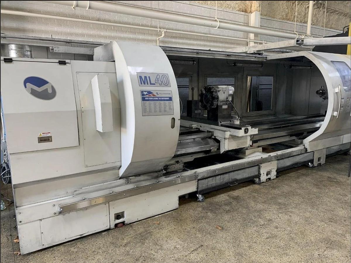 Used 2010 Milltronics ML40/160 with 14" Big Bore Spindle, 31.5" 3 Jaw Manual Chuck, Tailstock, 12 Station Turret, (2) Steady Rests