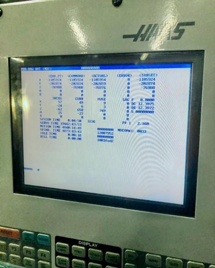 Used 2004 Haas VF2D with 4th Axis Drive, 24 Station Side Mount ATC, Chip uger, Programmable Coolant