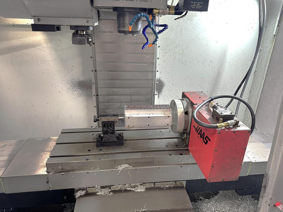Used 2002 Haas VF2D with Haas Rotary Table, 24 Station Side Mount ATC, Chip Auger, Programmable Coolant